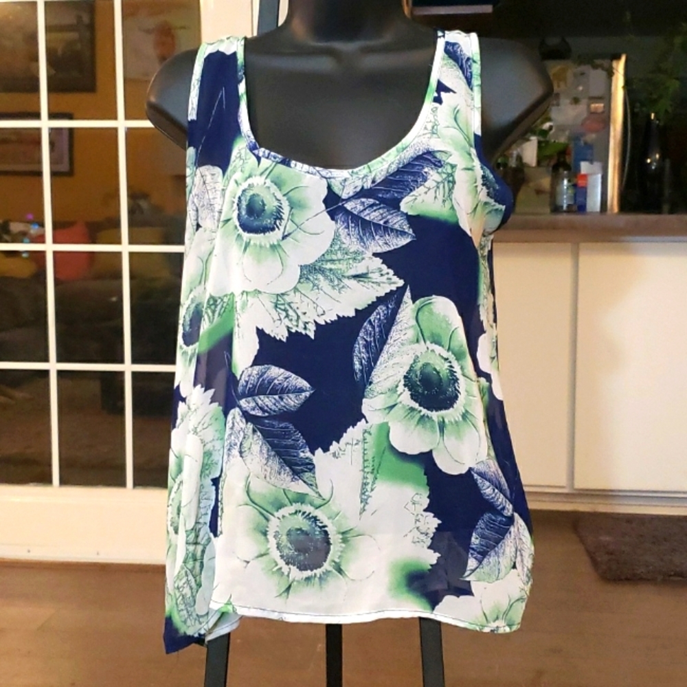 M. C.Flowy floral sleeves blouse with a T-strap in the back. Size L